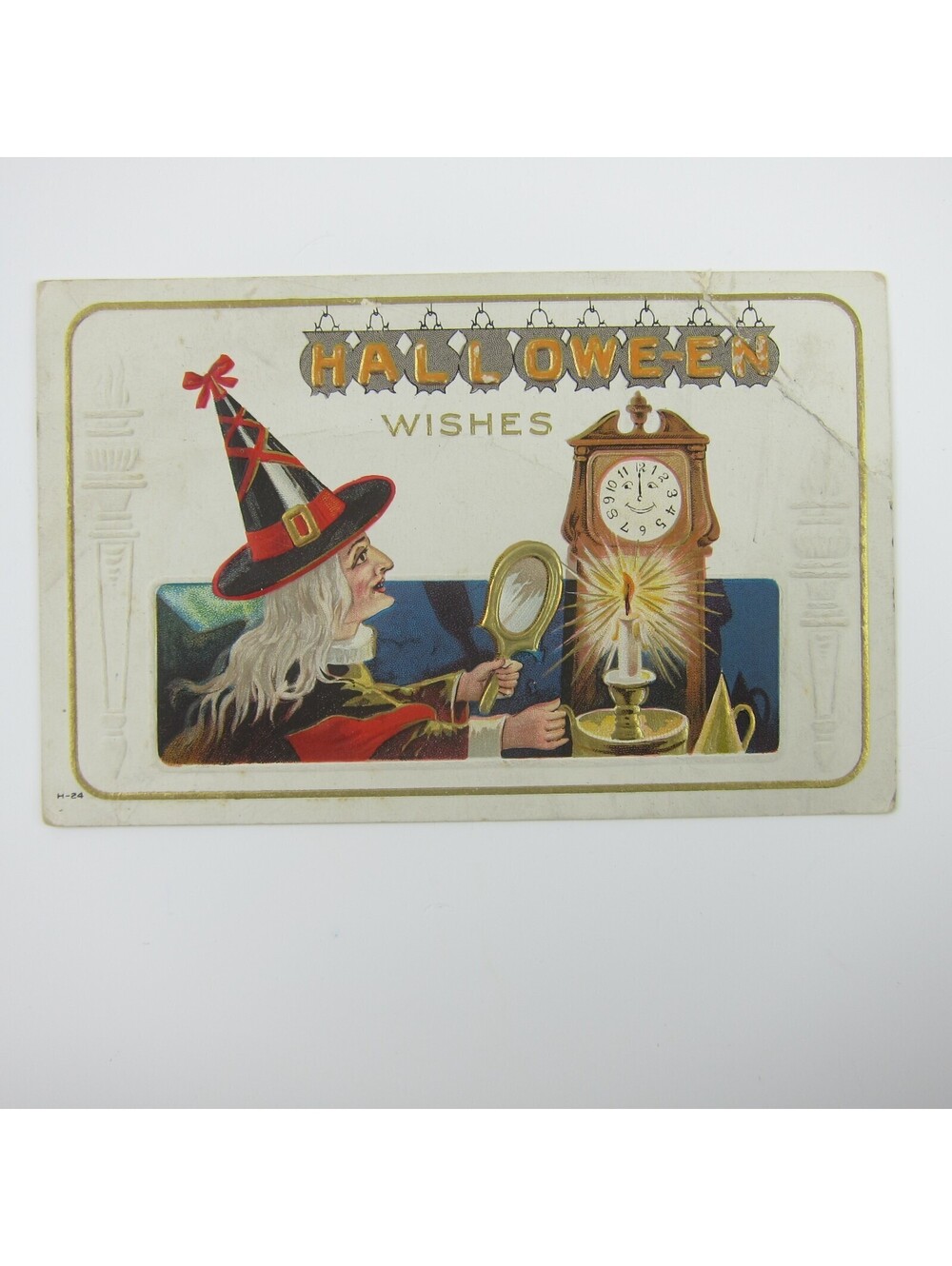 Vintage Halloween Postcard Witch Gray Hair Holds Mirror Candle Clock with Face